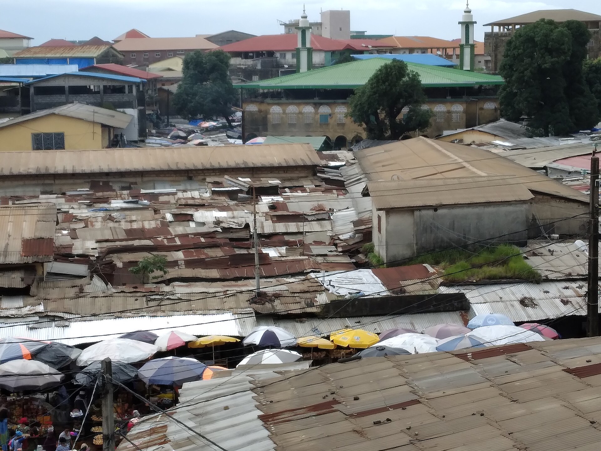 The roofs of Madina market in Conakry, umbrellas and metal sheets